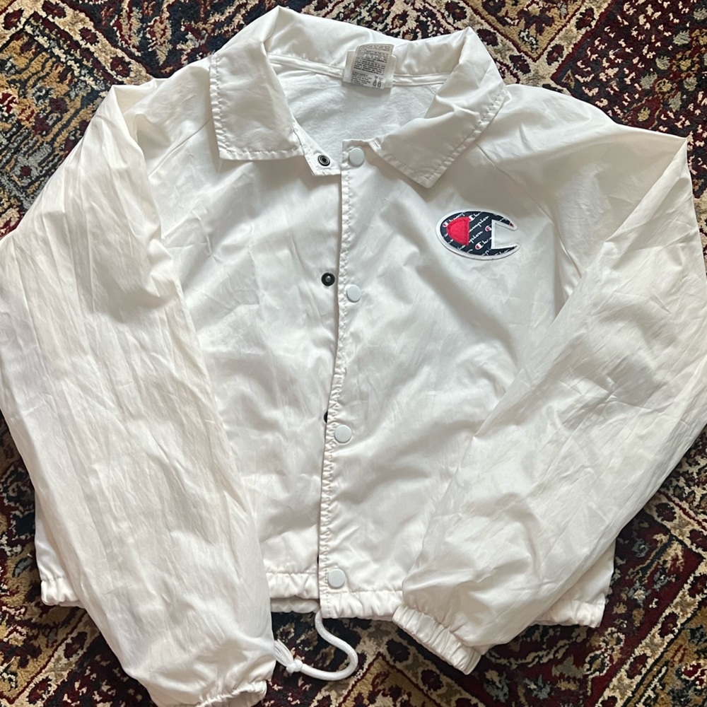 White champions wind breaker